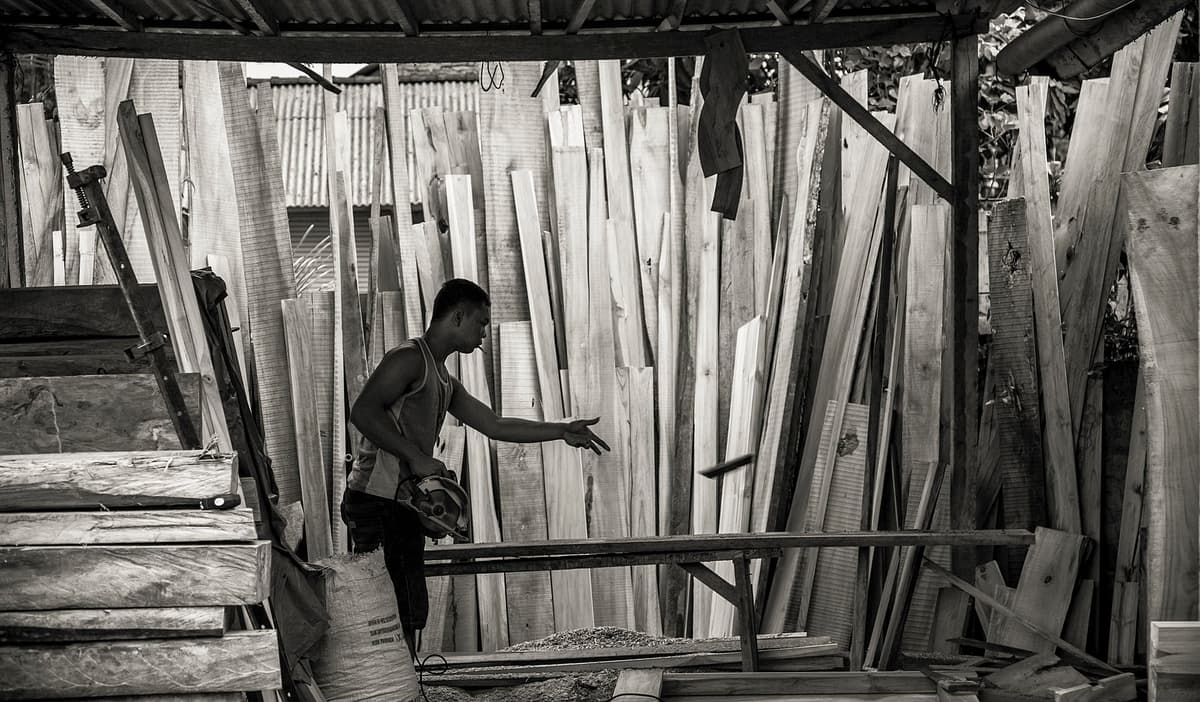 Carpenter working at a timber bench